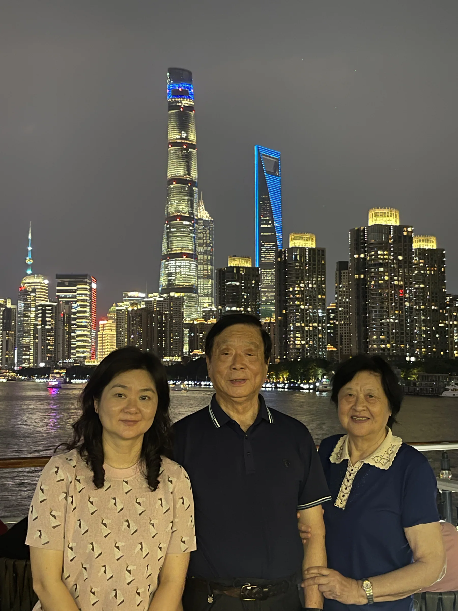 My maternal grandparents and family at night in Shanghai